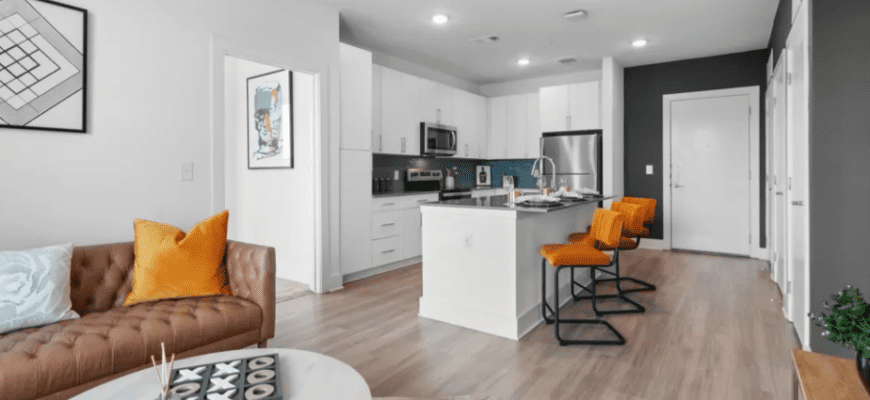 open living room leading to the kitchen